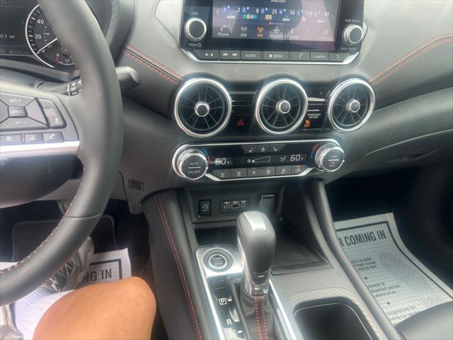 Photo of 2025 Aspen White Tricoat/Super Black Nissan Sentra