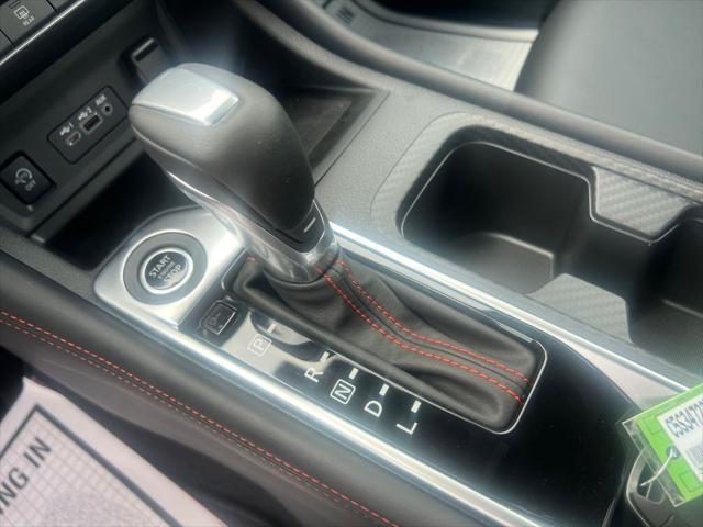 Photo of 2025 Aspen White Tricoat/Super Black Nissan Sentra