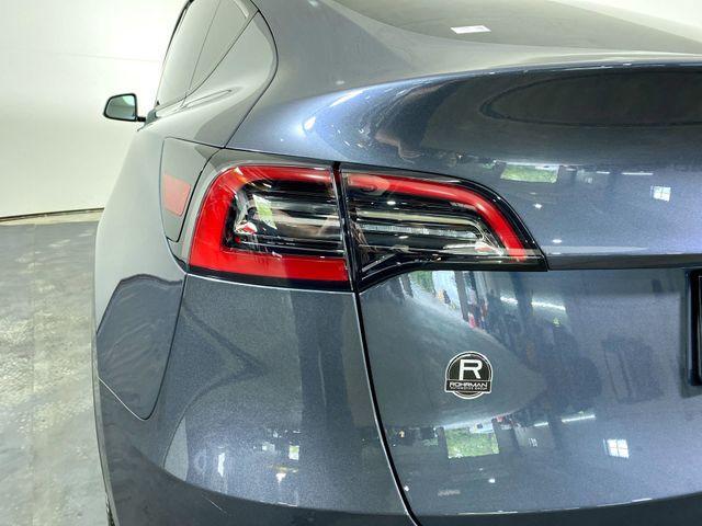 Photo of 2023 Deep Blue Metallic Tesla Model Y