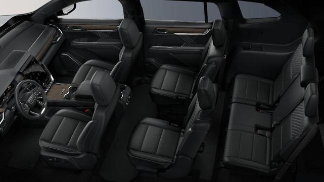 Photo of 2026 Volcanic Red GMC Acadia