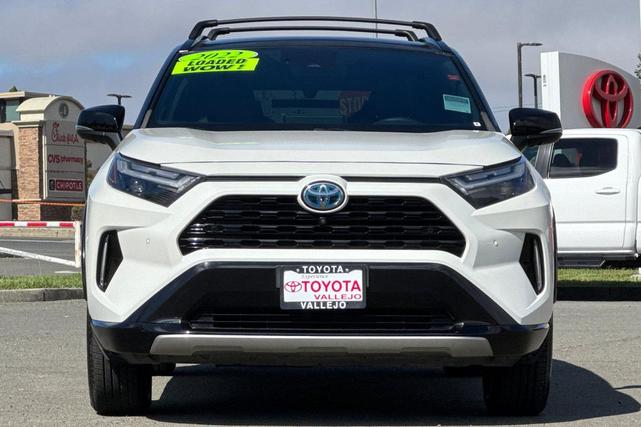 Photo of 2022 Blizzard Pearl/Midnight Black Metallic Toyota RAV4 Hybrid