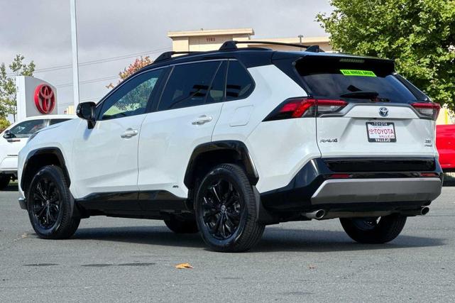 Photo of 2022 Blizzard Pearl/Midnight Black Metallic Toyota RAV4 Hybrid