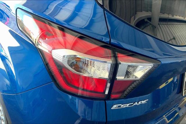 Photo of 2018 Lightning Blue Metallic Ford Escape