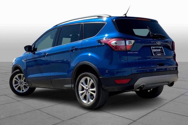 Photo of 2018 Lightning Blue Metallic Ford Escape