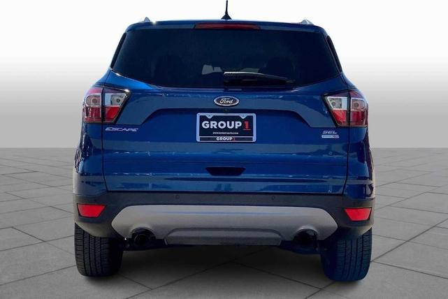 Photo of 2018 Lightning Blue Metallic Ford Escape