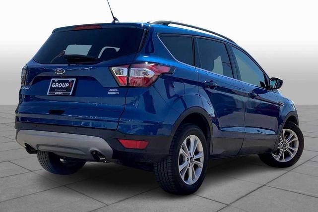 Photo of 2018 Lightning Blue Metallic Ford Escape
