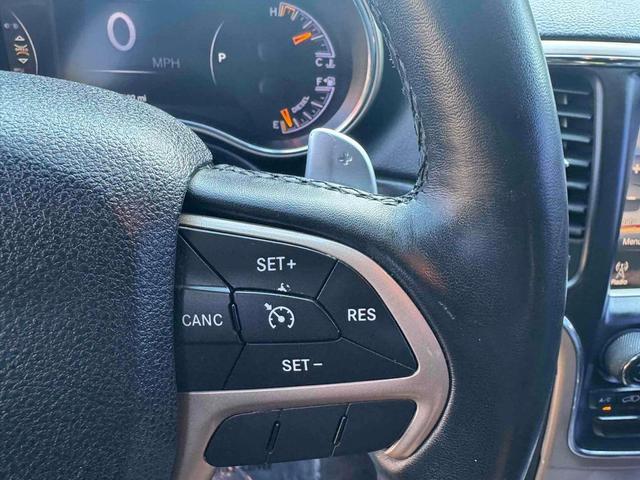 Photo of 2015 Granite Crystal Metallic Clearcoat Jeep Grand Cherokee