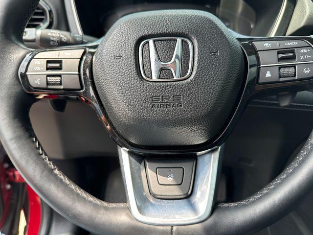 Photo of 2023 Radiant Red Metallic II Honda Pilot