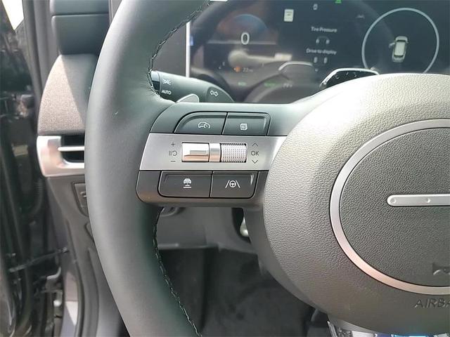 Photo of 2025 Titan Gray Hyundai TUCSON Hybrid