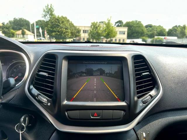 Photo of 2015 Deep Cherry Red Crystal Pearlcoat Jeep Cherokee