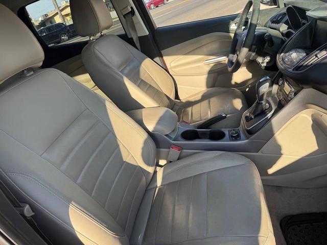 Photo of 2014 Sunset Metallic Ford Escape