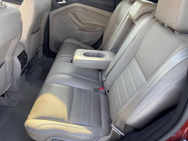 Photo of 2014 Sunset Metallic Ford Escape