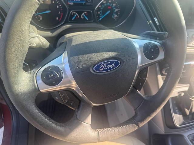 Photo of 2014 Sunset Metallic Ford Escape