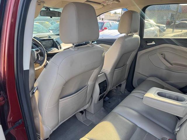 Photo of 2014 Sunset Metallic Ford Escape