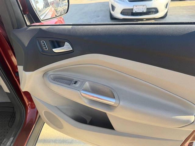 Photo of 2014 Sunset Metallic Ford Escape