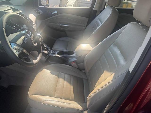 Photo of 2014 Sunset Metallic Ford Escape