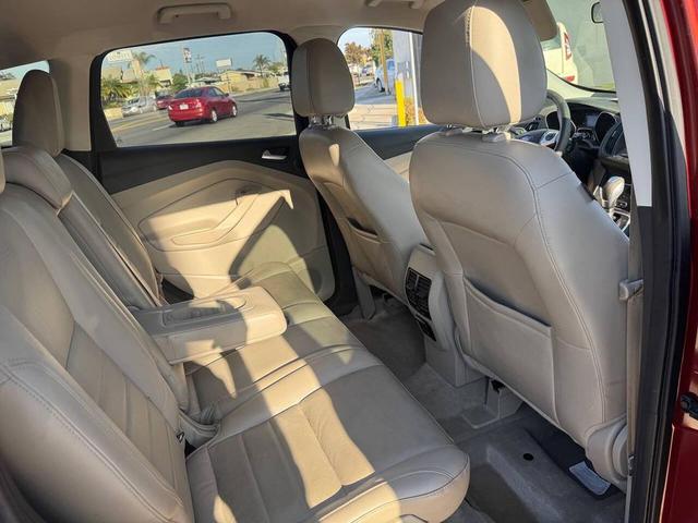 Photo of 2014 Sunset Metallic Ford Escape