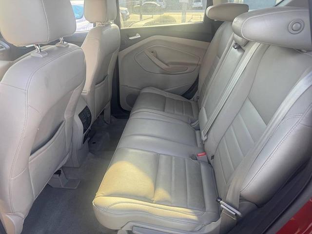 Photo of 2014 Sunset Metallic Ford Escape