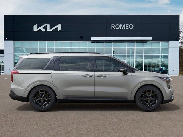 Photo of 2025 Ivory Silver Kia Carnival Hybrid