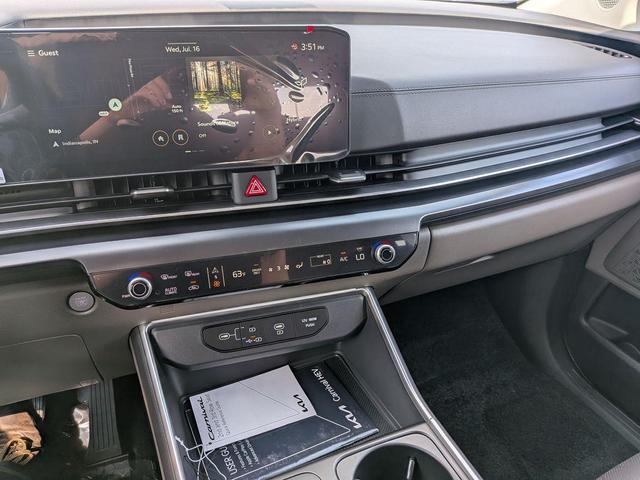 Photo of 2026 Snow White Pearl Kia Carnival Hybrid
