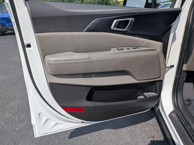 Photo of 2026 Snow White Pearl Kia Carnival Hybrid