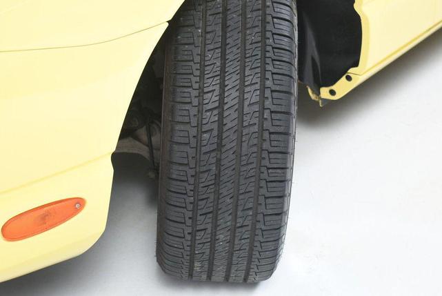 Photo of 2002 Inspiration Yellow Ford Thunderbird