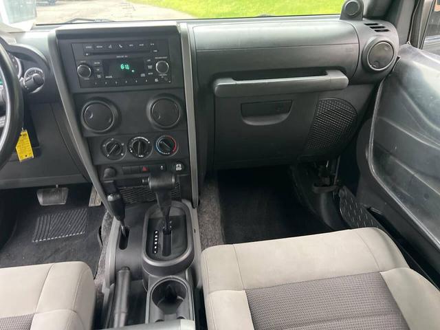 Photo of 2010 Green Jeep Wrangler Unlimited