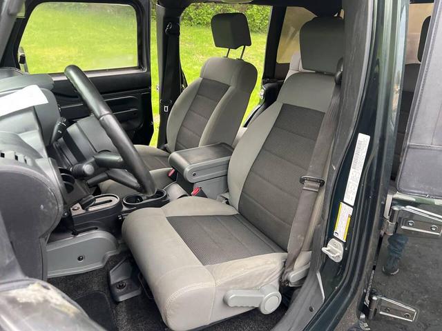 Photo of 2010 Green Jeep Wrangler Unlimited