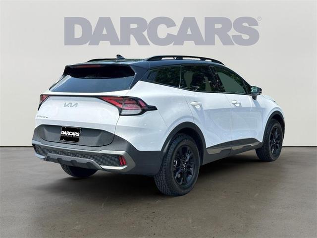 Photo of 2024 Glacier White Pearl/Ebony Black Roof Kia Sportage