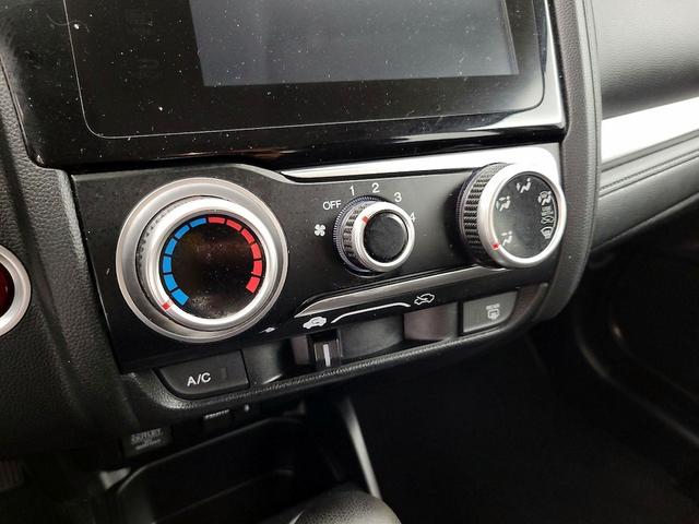 Photo of 2015 White Honda Fit