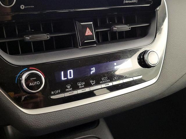 Photo of 2021 White Toyota Corolla Hybrid