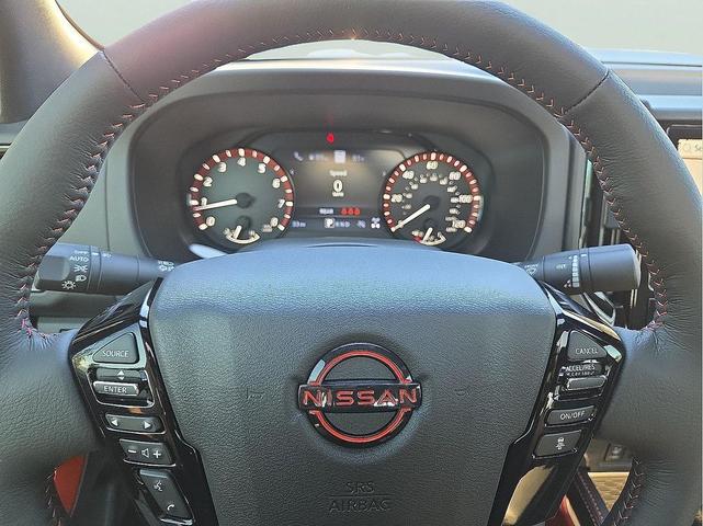 Photo of 2025 Glacier White Nissan Frontier