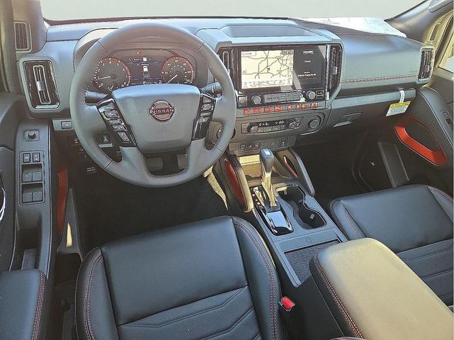 Photo of 2025 Glacier White Nissan Frontier