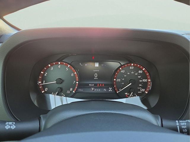 Photo of 2025 Glacier White Nissan Frontier