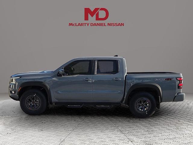 Photo of 2025 Glacier White Nissan Frontier
