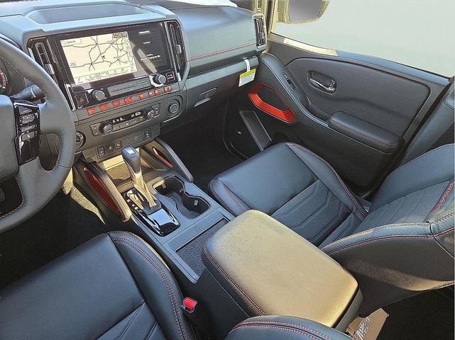 Photo of 2025 Glacier White Nissan Frontier