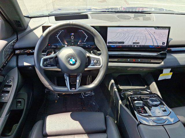 Photo of 2025 Blue Metallic BMW 530