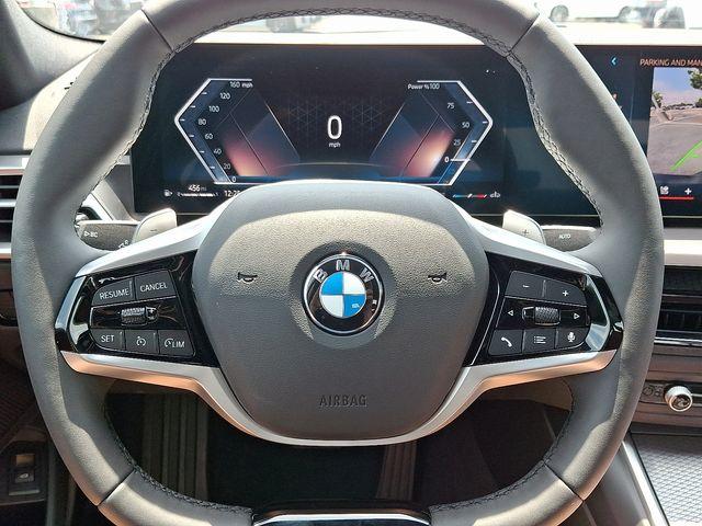 Photo of 2025 Jet Black BMW 330