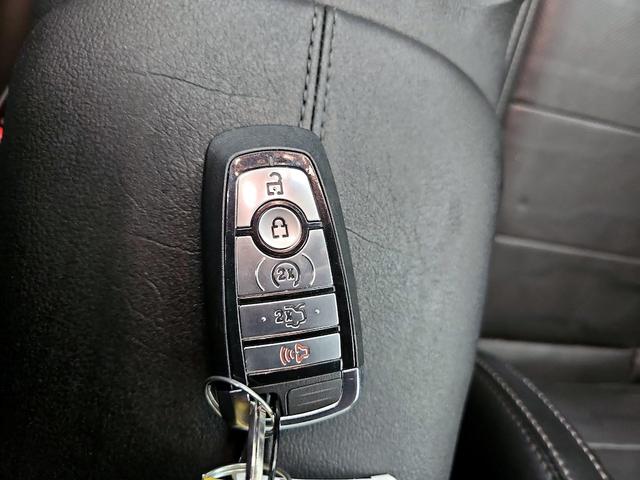 Photo of 2021 Black Ford Mustang