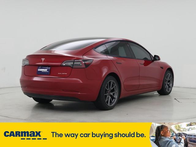 Photo of 2022 Red Tesla Model 3