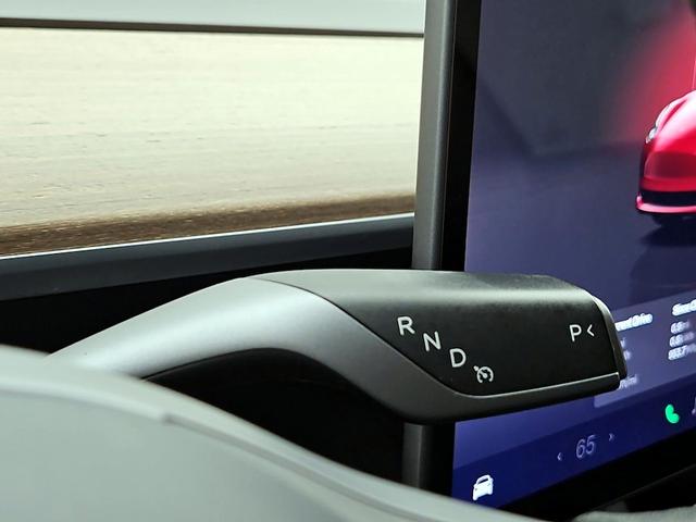 Photo of 2022 Red Tesla Model 3