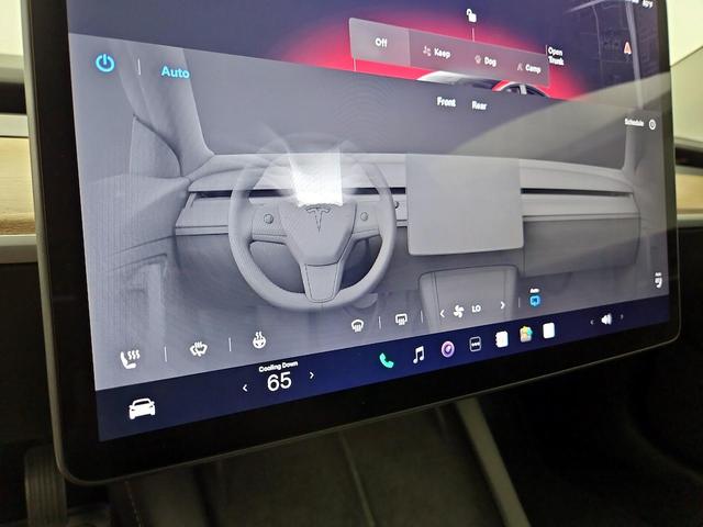 Photo of 2022 Red Tesla Model 3