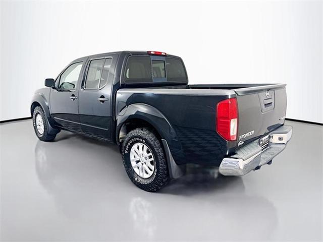 Photo of 2019 Magnetic Black Pearl Nissan Frontier