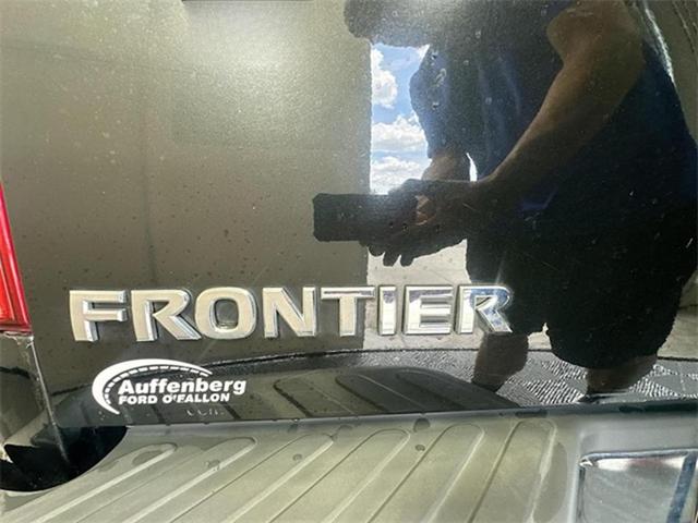 Photo of 2019 Magnetic Black Pearl Nissan Frontier