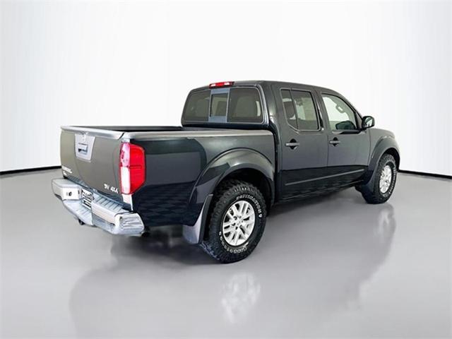 Photo of 2019 Magnetic Black Pearl Nissan Frontier
