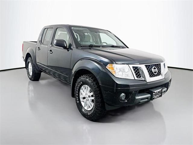 Photo of 2019 Magnetic Black Pearl Nissan Frontier