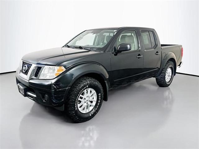 Photo of 2019 Magnetic Black Pearl Nissan Frontier
