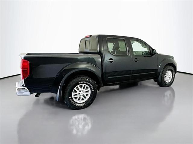 Photo of 2019 Magnetic Black Pearl Nissan Frontier