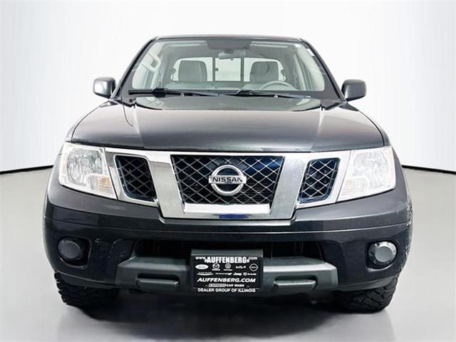 Photo of 2019 Magnetic Black Pearl Nissan Frontier