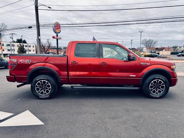 Photo of 2014 Burgundy Ford F-150